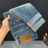 Jeans elásticos ajustados, jeans de corte holgado y pierna cónica, nueva colección otoño 2026, pantalones largos casuales, modernos y versátiles para hombre