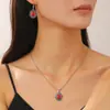 Venta caliente transfronteriza, pendientes y collar con flores geométricas turquesas étnicas vintage bohemias para otoño e invierno.