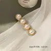 Pin de pelo de perla con temperamento francés para mujer, pinza lateral de flequillo de alta gama, pinza de pico de pato de una palabra para pelo suelto, pinza para el pelo, accesorio para el cabello