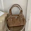 Bolsa feminina versátil transfronteiriça 2026 outono retrô nova para o dia a dia grande capacidade sob o braço moda bolsa de ombro