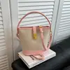 Bolsas de Mujer Transfronterizas 2026 Nueva Moda Primavera Tendencia Bolso de Mano Bolso Cubo Color Bloqueo Nicho Bolso de Hombro Cruzado