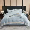 Juego de ropa de cama de cuatro piezas de felpa con relieve tridimensional, totalmente mate y de alta densidad, engrosado para el calor del invierno, juego de terciopelo de leche transfronterizo