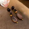 Pendientes de botón con colgante de flor redonda de Aguja de Plata Estilo Étnico Retro Artístico Pendientes Sencillos de Nicho con Sensación de Alta Gama Adornos para Orejas Accesorios