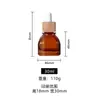 Botella cuadrada de vidrio marrón de alta gama con gotero para suero para el cabello de 30 ml, de madera de bambú personalizada, engrosada, para aceites esenciales para el cuidado del cabello, OEM