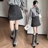Saia curta de lã feminina para outono e inverno, saia de lã em A de cintura alta com shorts embutidos, meia-saia super estilosa