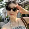 Nuevas Gafas de Sol de Alta Gama con Sentido Blanco Cremoso de Chica Dulce Ojo de Gato para Mujer Cara Redonda Verano Polarizadas Protección UV