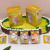 Nova Boneca Criativa de Grão de Arroz Caixa Surpresa Desenho Animado Fofo Brinquedo Moderno Mini Figura Ornamento de Mesa Presente