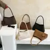Comercio exterior, bolso de axila tejido ligero de lujo para mujer, estilo retro de otoño, versátil para ir al trabajo, con un aspecto sofisticado y elegante, bolso de hombro o bolso de mano