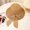Chapéu de sol transfronteiriço feminino com laço chapéu de pescador proteção solar chapéu de palha chapéu de papel aba larga chapéu de praia chapéu casual atacado