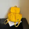 Mochila nueva de moda de color liso, mochila de viaje, adecuada para estudiantes de secundaria y universidad, portátil y elegante, ideal para viajes cortos