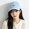 Gorra de visera de pato de color liso bordada con corazón, gorra de béisbol vintage de copa suave, sombrero de sol versátil unisex al por mayor