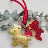 Oro Puro 999 Año del Caballo Modelo Nuevo Llavero "Hazte Rico al Instante" Serie de Regalos de San Valentín Correa para Teléfono Regalo de Año Nuevo