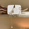 Arete de Oreja de Perla, Clip para Oreja Sin Perforar, Lujo Ligero, Diseño de Nicho de Gama Alta, Pendientes con Borla de Flor