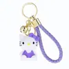 Lindo Llavero de Nudo de Lazo Gato Kt Figura de Resina Hello Kitty Colgante de Cuerda Trenzada Encanto Versátil de Bolsa de Dibujos Animados