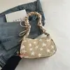 Bolsa de um ombro de alto valor, bolsa estampada retrô fashion, bolsa franzida sob o braço, bolsa de mão franzida de nicho, versátil para sair.