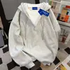 Sudadera con capucha perezosa y chic simple para mujer, diseño falso de dos piezas, chaqueta gruesa de terciopelo suelta para otoño e invierno, popular en Instagram