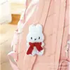 Lindo juguete de peluche al por mayor colgante para mochila muñeca de peluche de dibujos animados bolsa de puesto llavero Velcro colgador de bolsa de estudiante