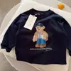 Camiseta de manga larga para bebé, primavera y otoño, algodón puro, caricatura de oso, versátil, estilo nuevo, top para niños, ropa infantil estampada para niñas