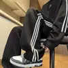Pantalones para hombre al por mayor de fábrica, sensación de lujo ligero y alta gama, pantalones casuales deportivos versátiles para jóvenes de otoño, pierna recta, para exteriores