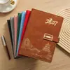 Agenda estilo chino 2027 con estampado dorado y cierre magnético metálico, cuaderno grueso, disponible en varios colores, logo personalizable