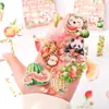 Diario musical de frutas, pegatinas transparentes e impermeables para mascotas, pegatinas para diario de cuentas de mano, pegatinas de animales en caja con pastel de frutas transfronterizo
