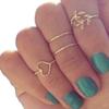 En 2015, AliExpress vendió decenas de miles de anillos de cuatro piezas con hojas populares, clavos de comercio exterior europeos y americanos J004.