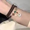 Nuevo Pulsera de Perlas Estilo Chino con un Toque de Lujo Ligero y de Alta Gama, Tendencia de Moda Retro de Nicho, Joyería de Pulsera de Perlas Versátil