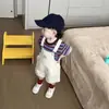 Conjunto de Verano para Niños 2026 Estilo Nuevo Camiseta de Manga Corta Rayada Versátil Delgada para Niños y Pantalones Cortos Sueltos con Tirantes