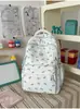Nova mochila de alta qualidade, simples e fofa, em tons de azul e rosa, mochila de nicho de grande capacidade para meninas do ensino fundamental, médio e universitário