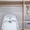 Suministro directo de fábrica estilo TikTok perchero de nueve agujeros perchero mágico giratorio multifuncional de 9 agujeros perchero de ropa de almacenamiento plegable