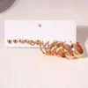Pendientes de botón europeos y americanos transfronterizos de plata, forma de corazón con aguja plateada y diseño retorcido, pendientes elegantes con sentido de lujo y diseño de alta gama, estilo nicho