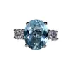 Huajie AliExpress ebay anillo caliente incrustado anillo de aguamarina grande en forma de huevo joyería de comercio exterior para mujer lote