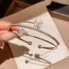 Pulsera de Zirconia Ojo de Gato Trébol Multicapa Abrible Lujo Ligero Gama Alta Simple Estilo Coreano Moda Joyería de Mano para Mujeres