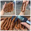 El fabricante suministra una colección de pulseras de hueso de durazno naturales, pulseras de hueso de durazno de círculo único para hombres y mujeres, populares en Xiaohongshu, con diseño de agujero pasante