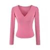 Camiseta rosa de manga larga con cuello cruzado para mujer, adecuada para principios de otoño, con diseño entallado a la cintura, elegante y versátil, top corto