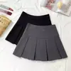 Saia Plissada Cinza Feminina Outono Inverno Cintura Alta Curta Design Moderno Emagrecedora Versátil Anti-exposição Saia Evasê Novo Estilo 2026