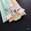 Fivela de rodapé de PVC piso de madeira fixo acessórios de plástico clipes linha de canto piso de fibra de madeira de bambu Mai Tai Bao