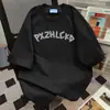 Camiseta de Manga Curta com Estampa de Letras Graffiti Estilo Americano para Mulheres 2026 Verão Nova Oversize Solta