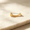 Broche de cara sonriente anti-exposición para mujer, diseño único, accesorio versátil para camisa, pasador de fijación de cuello para ropa, venta al por mayor