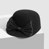 Gorra de pato de lana nueva de Hua Qiao para otoño e invierno, sombrero con lazo de cáñamo de seda para mujer, dulce y combinable.