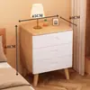 Mesita de noche de madera maciza para dormitorio del hogar 2026 Venta caliente Creativa Pequeño Armario de almacenamiento simple para niños Mesita de noche de tronco