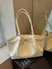 Bolso de mano de nicho de alta gama coreano, bolso tote de gran capacidad, lazo de moda, bolso dulce para el hombro