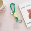 Adecuado para todo tipo de accesorios colgantes de cordón portátiles, gancho para llaves de mochila, colgante de carcasa de teléfono móvil transparente de doble color