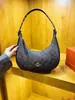 Bolso de mujer estilo vintage modelo nuevo 2026, versátil para el trabajo, bolso de hombro de media luna a la moda y casual, bolso de hombro popular con forma de cuerno
