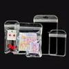 Fabricantes Chengxing bolsa transparente de plástico autosellante bolsa de embalaje para joyería bolsa selladora para pendientes arte de uñas joyería pequeña bolsa de hueso Yin y Yang