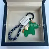 Dinero en el Caballo Cuero de Vaca Creativo Exquisito Casual Regalo de Pareja Bolso Lindo Colgante Llavero de Coche Llavero