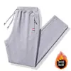 Pantalones de chándal de cordero con forro polar Ropa exterior engrosada Pantalones casuales cálidos Ropa exterior Pantalones deportivos para hombre 2024 Nuevo Invierno