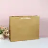 Bolsa de tela para ropa de tienda de ropa de alta gama bolsa de compras repujada con bronceado bolsa de regalo bolsa de tela bolsa de cartón blanco