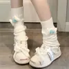 Calcetines Cálidos de Otoño e Invierno Nuevos Calcetines de Pierna Dibujos Animados Lolita Versátiles Lindos Calcetines de Felpa Calcetines de Punto de Hueso de Gama Alta para Mujer