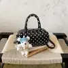 Bolso de mano de moda, bolso cruzado para mujer, bolso de hombro súper popular para el trabajo 2026 con diseño de almohada de lunares